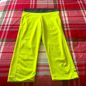Women’s medium dri fit cropped neon leggings